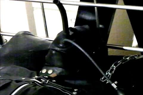Wearing A Rubber Cat Suit Inside A Leather Body Bag handcuffed To The sofa, Hooded And Gagged, Then Teased For Two Hours Until that man cum.