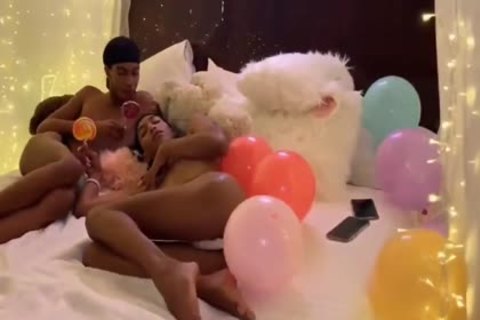 Threesome at the party together with muscled twink